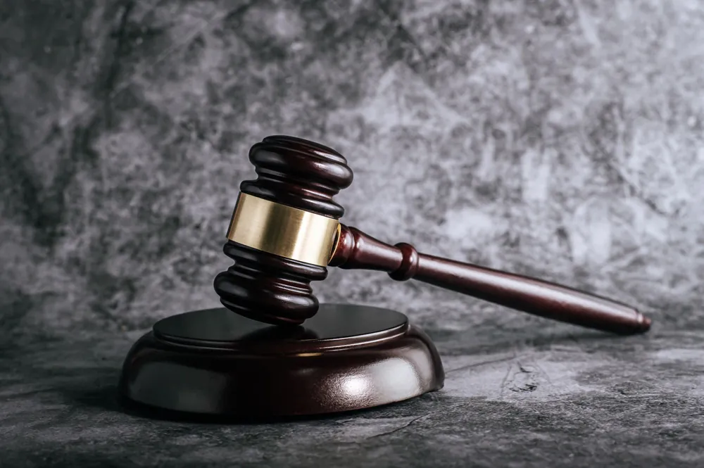 Judge's gavel on a sound block