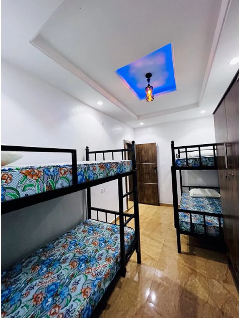 Shared hostel room with bunk beds